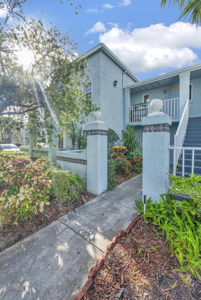 view of property exterior featuring a balcony