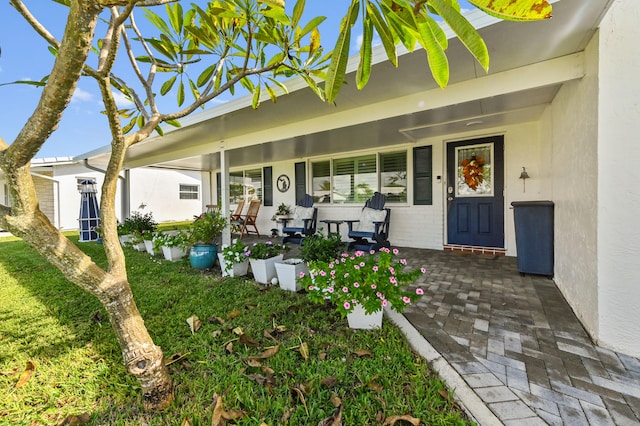 entrance to property with a porch