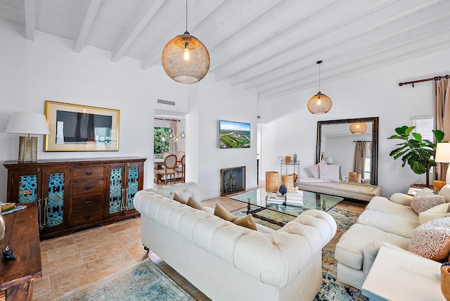 living room featuring beamed ceiling, high vaulted ceiling, and wooden ceiling