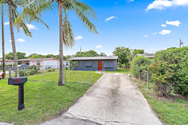 view of front of property with a front lawn