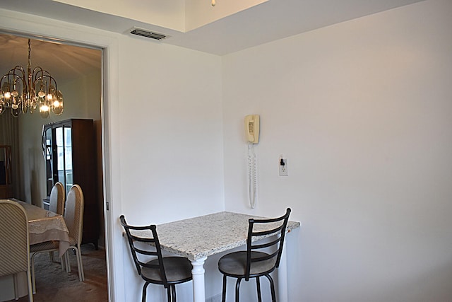 dining area with a chandelier