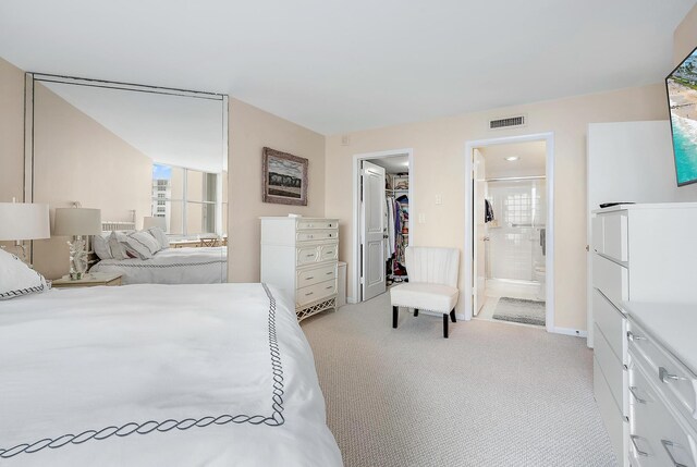 bedroom featuring light colored carpet