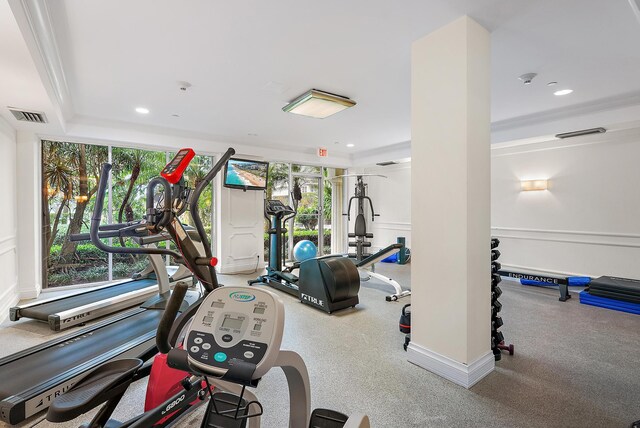 gym featuring ornamental molding