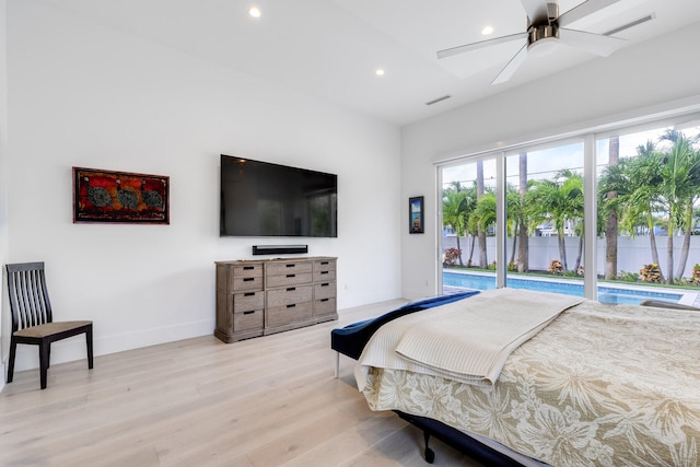 bedroom featuring ceiling fan, light hardwood / wood-style flooring, and access to outside