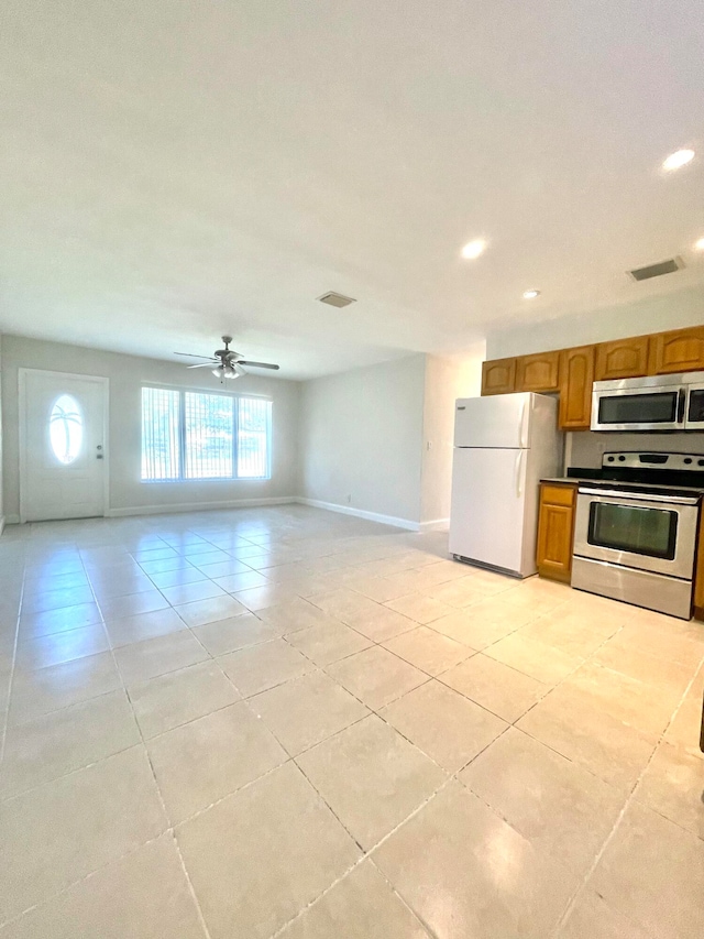 kitchen with stainless steel appliances and ceiling fan