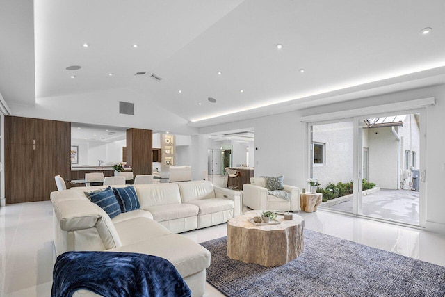 living room with lofted ceiling