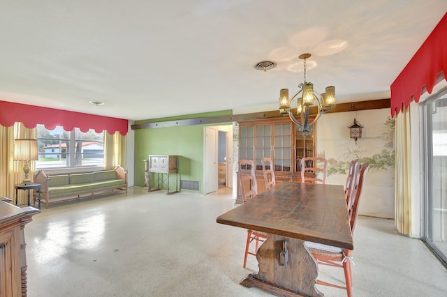 dining room featuring an inviting chandelier