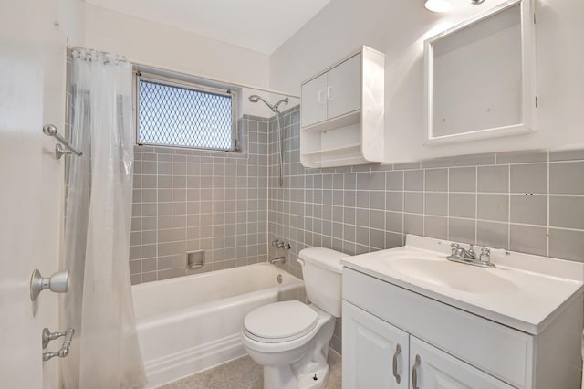 full bathroom featuring shower / bath combo with shower curtain, vanity, tile walls, and toilet