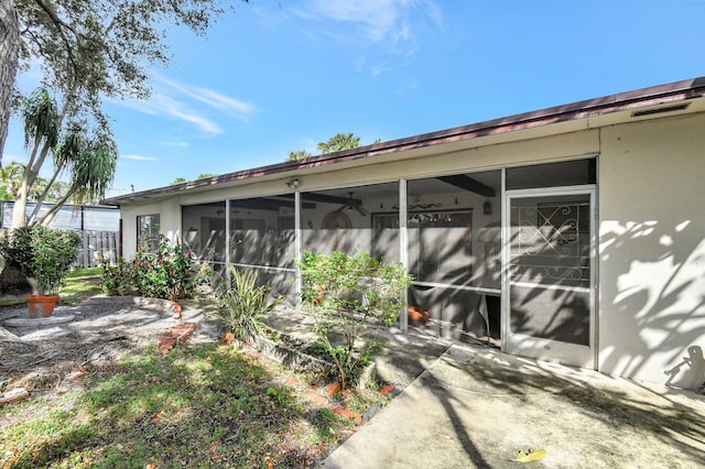 exterior space with a sunroom