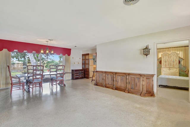 dining area with a chandelier