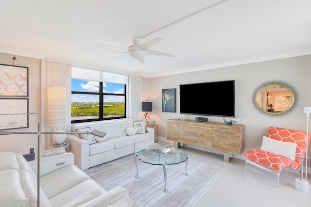 living room featuring ceiling fan and ornamental molding