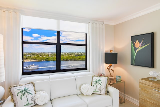 2003 N Ocean Blvd Unit 1203, Boca Raton, FL 33431 - living room featuring crown molding, baseboards, a water view, and wood finished floors