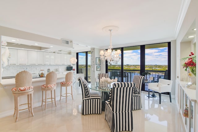 2003 N Ocean Blvd Unit 1203, Boca Raton, FL 33431 - dining area with a chandelier, ornamental molding, baseboards, floor to ceiling windows, and light tile patterned flooring