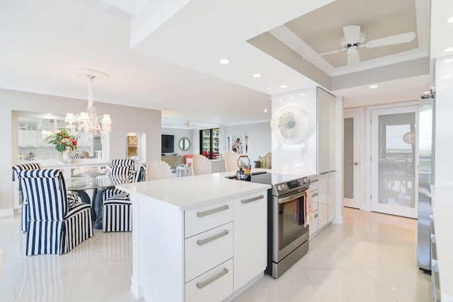 2003 N Ocean Blvd Unit 1203, Boca Raton, FL 33431 - kitchen featuring modern cabinets, ornamental molding, stainless steel range with electric stovetop, white cabinets, and light countertops