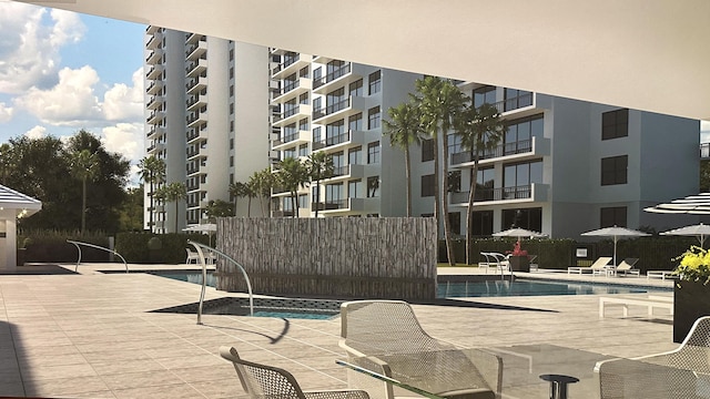 2003 N Ocean Blvd Unit 1203, Boca Raton, FL 33431 - community pool featuring a patio area