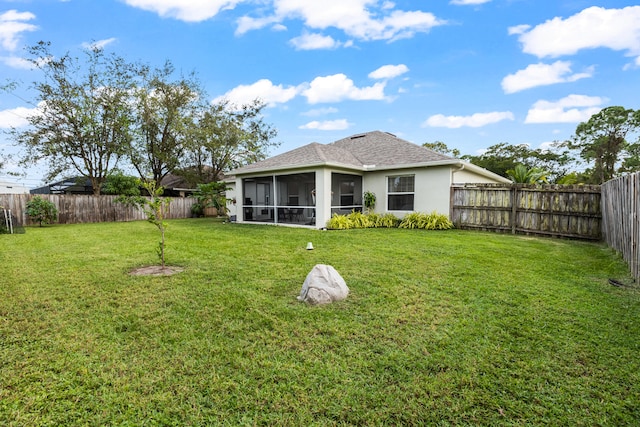 view of yard featuring a sunroom