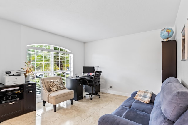 office area featuring light tile patterned flooring