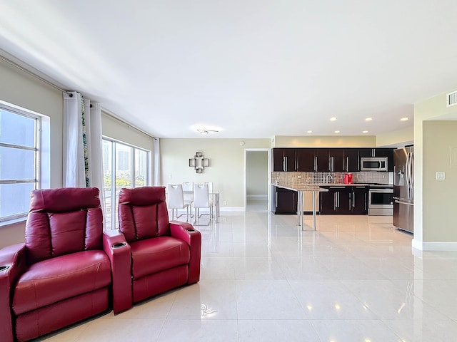 living room with light tile patterned floors