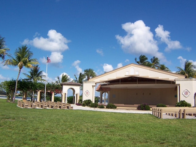 view of front facade featuring a front lawn and a gazebo