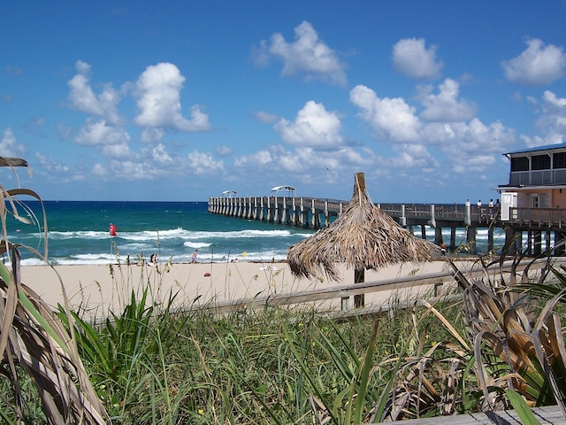 view of water feature with a beach view