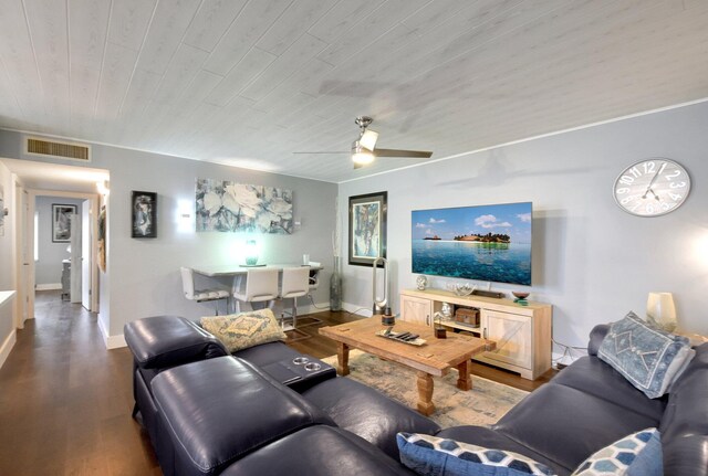 living room featuring ceiling fan and wood-type flooring