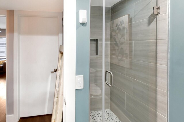 bathroom featuring walk in shower