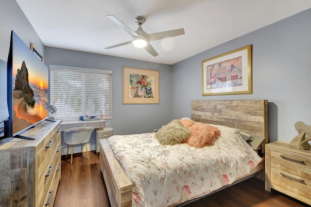 bedroom featuring ceiling fan and dark hardwood / wood-style flooring