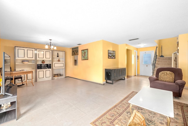 living room featuring a chandelier