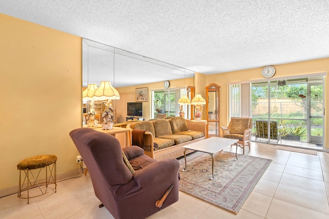 tiled living room with plenty of natural light and a textured ceiling