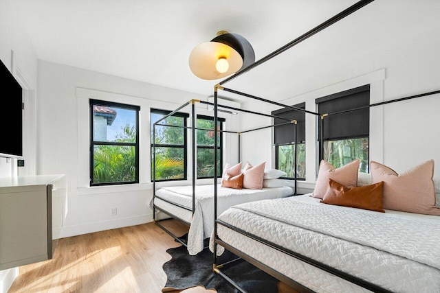 bedroom featuring light wood-type flooring