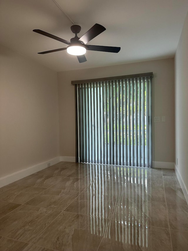 spare room featuring ceiling fan