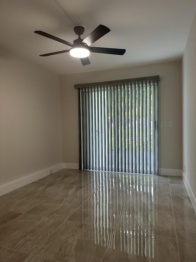 256 Suffolk Unit G, Boca Raton, FL 33434 - unfurnished room featuring marble finish floors, ceiling fan, and baseboards