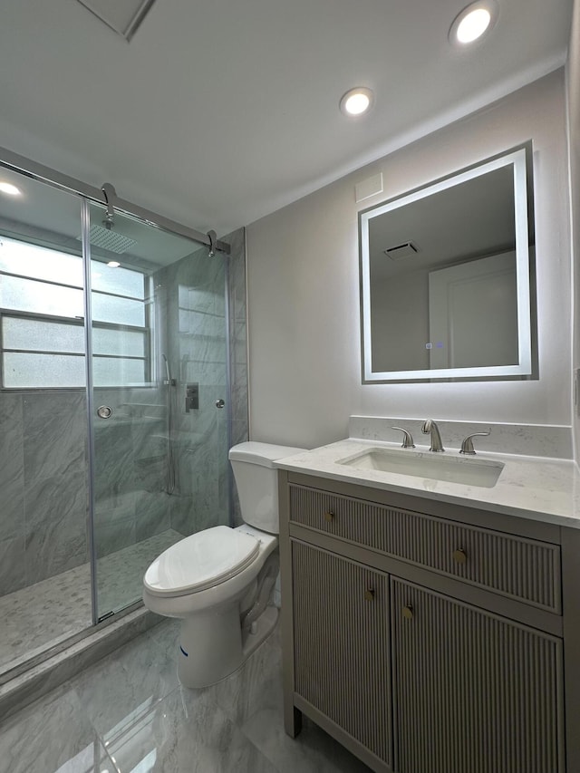 256 Suffolk Unit G, Boca Raton, FL 33434 - bathroom featuring a stall shower, toilet, vanity, marble finish floors, and recessed lighting