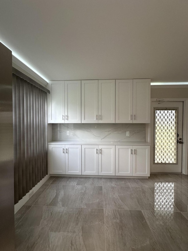 256 Suffolk Unit G, Boca Raton, FL 33434 - kitchen with white cabinetry and light countertops