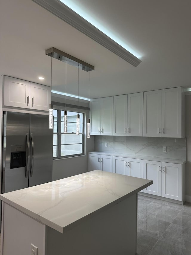 256 Suffolk Unit G, Boca Raton, FL 33434 - kitchen with stainless steel fridge with ice dispenser, light stone countertops, white cabinets, and tasteful backsplash