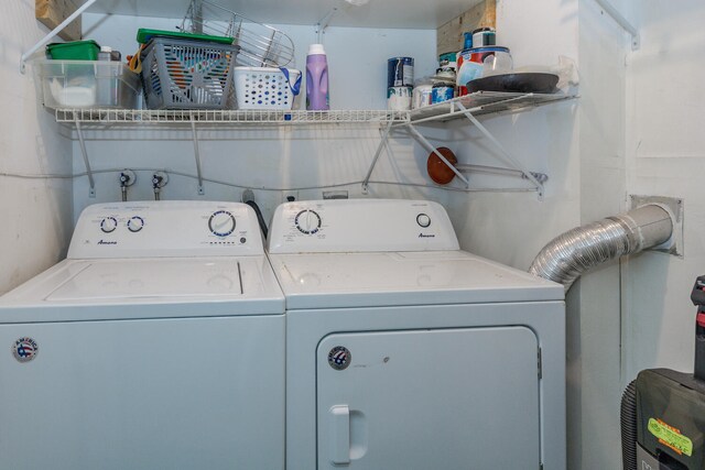 294 Burgundy Unit G, Delray Beach, FL 33484 - laundry room featuring washing machine and dryer