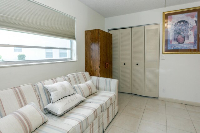 294 Burgundy Unit G, Delray Beach, FL 33484 - living area featuring light tile patterned flooring