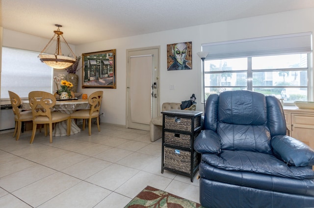 living area with light tile patterned flooring