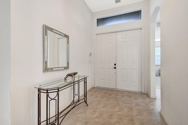 entrance foyer featuring light tile patterned floors