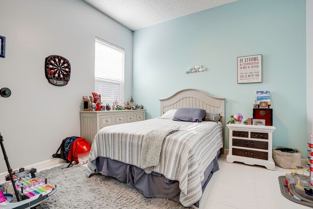 bedroom with a textured ceiling