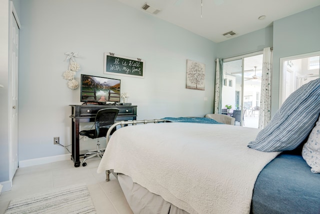 tiled bedroom with access to exterior