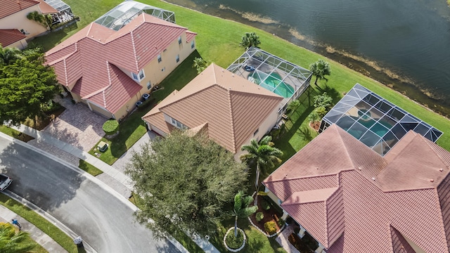 drone / aerial view with a water view