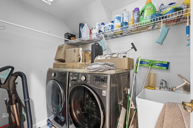 laundry room featuring washer and clothes dryer