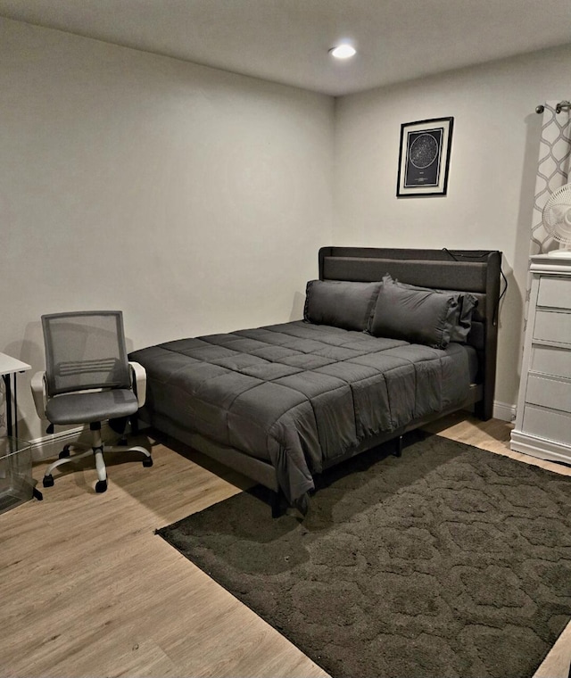 bedroom featuring light hardwood / wood-style floors