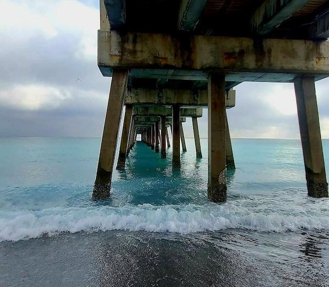 view of dock with a water view