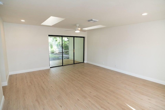 unfurnished room with light hardwood / wood-style flooring and ceiling fan