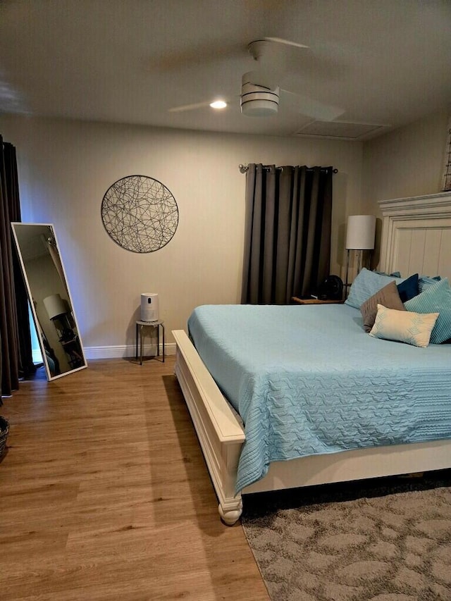 bedroom with light hardwood / wood-style floors