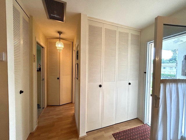 hall featuring light wood-style flooring