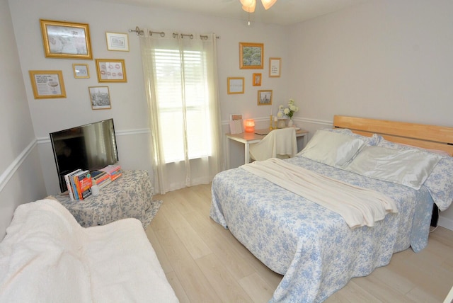 bedroom with light hardwood / wood-style floors