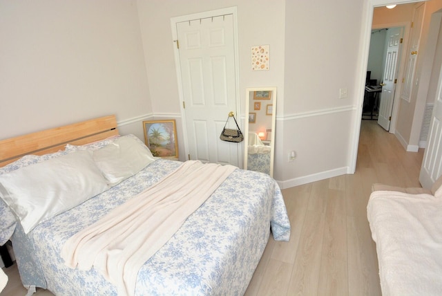 bedroom featuring light hardwood / wood-style flooring